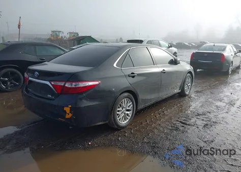 2015 Toyota Camry Hybrid Le z USA, uszkodzony, nr VIN 4T1BD1FKXFU176028